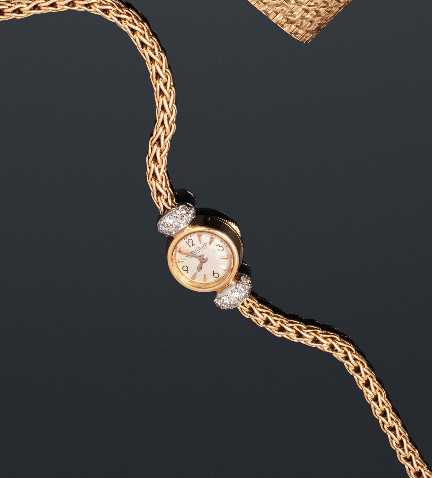 Null Jaeger Lecoultre

18K（750）黄金和铂金女士腕表，圆形银色表盘上有签名，铂金附件上铺有8/8切割钻石，柱形链带，机械机芯（不保证&hellip;
