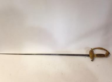 Null Epée d'uniforme.

Monture en bronze décoré et à une branche. Clavier orné d&hellip;