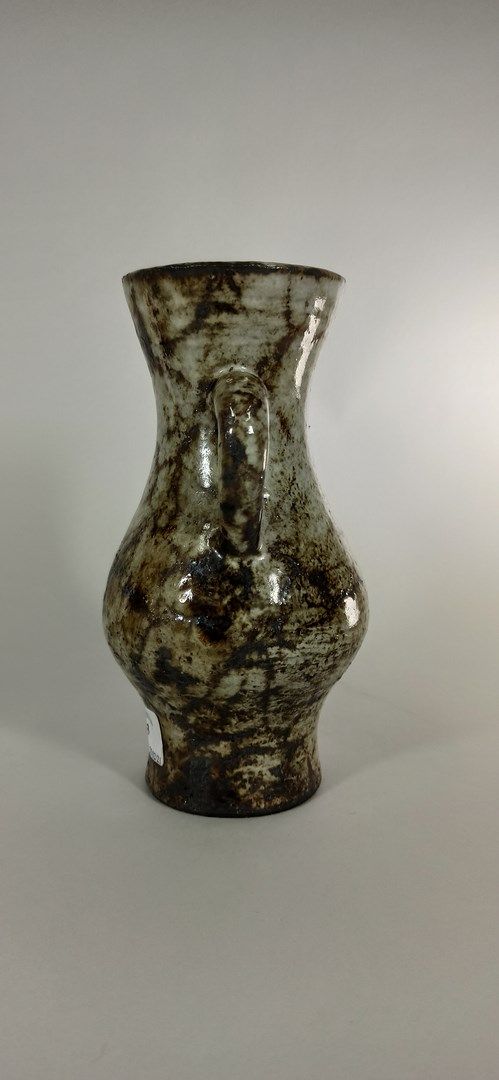 Null DERVAL Jean (1925 - 2010)

Vase with two handles.

Vallauris clay, handwrit&hellip;