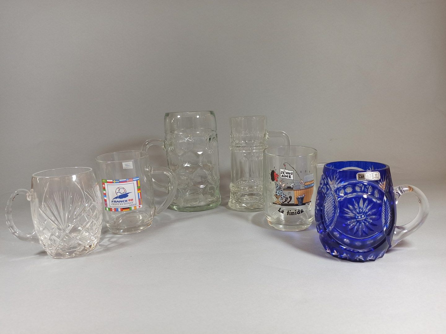 Null Set of 6 beer mugs, 2 in crystal and 4 in glass. 

(Fragments)