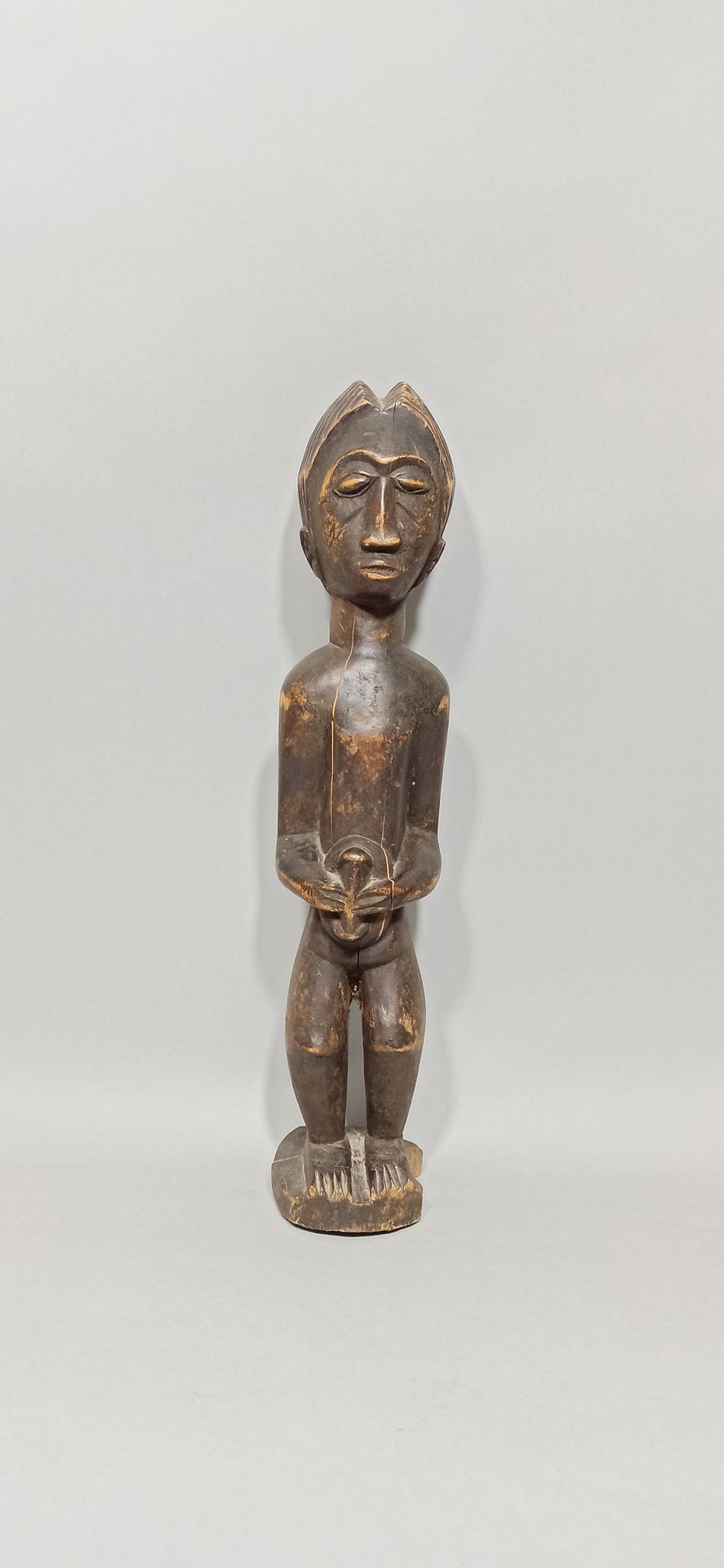 Null Estatuilla de Baule, Costa de Marfil.

Altura: 44,5 cm