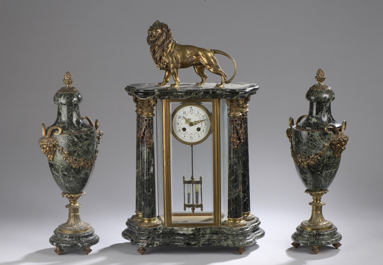 Null Verde Saint Denis marble mantel set consisting of a portico clock decorated&hellip;
