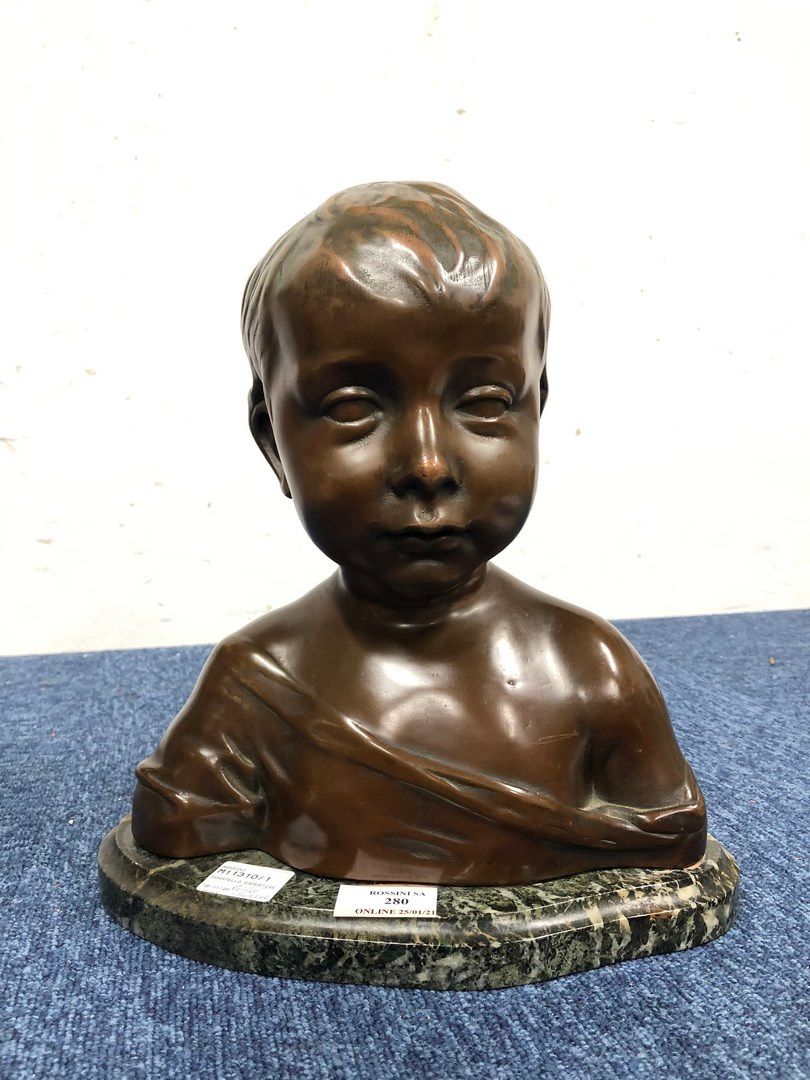 Null DONATELLO 

Bust of a child in copper with brown patina.

Base in green mar&hellip;