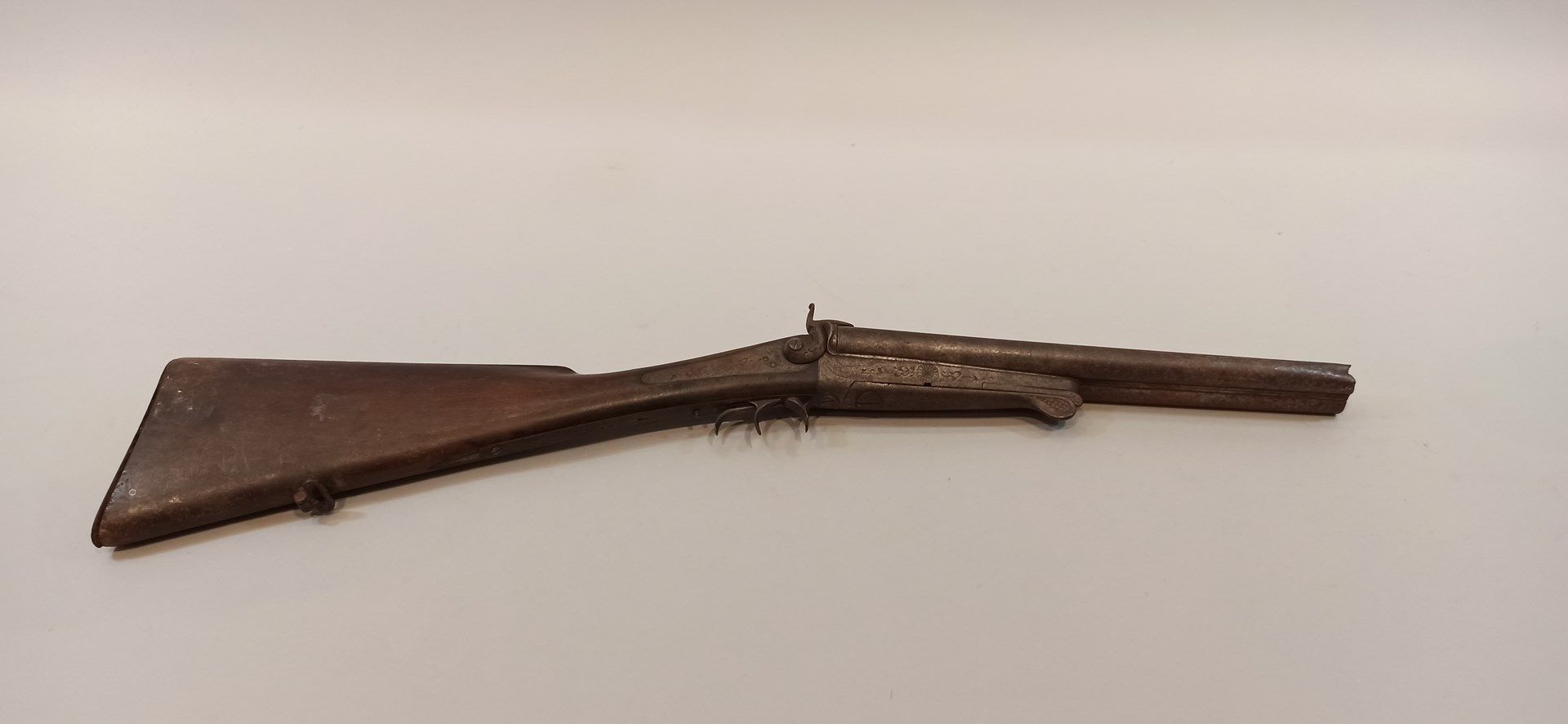 Null Fusil de chasse à broche.

Cal 12.

Canon raccourci, mauvais état.