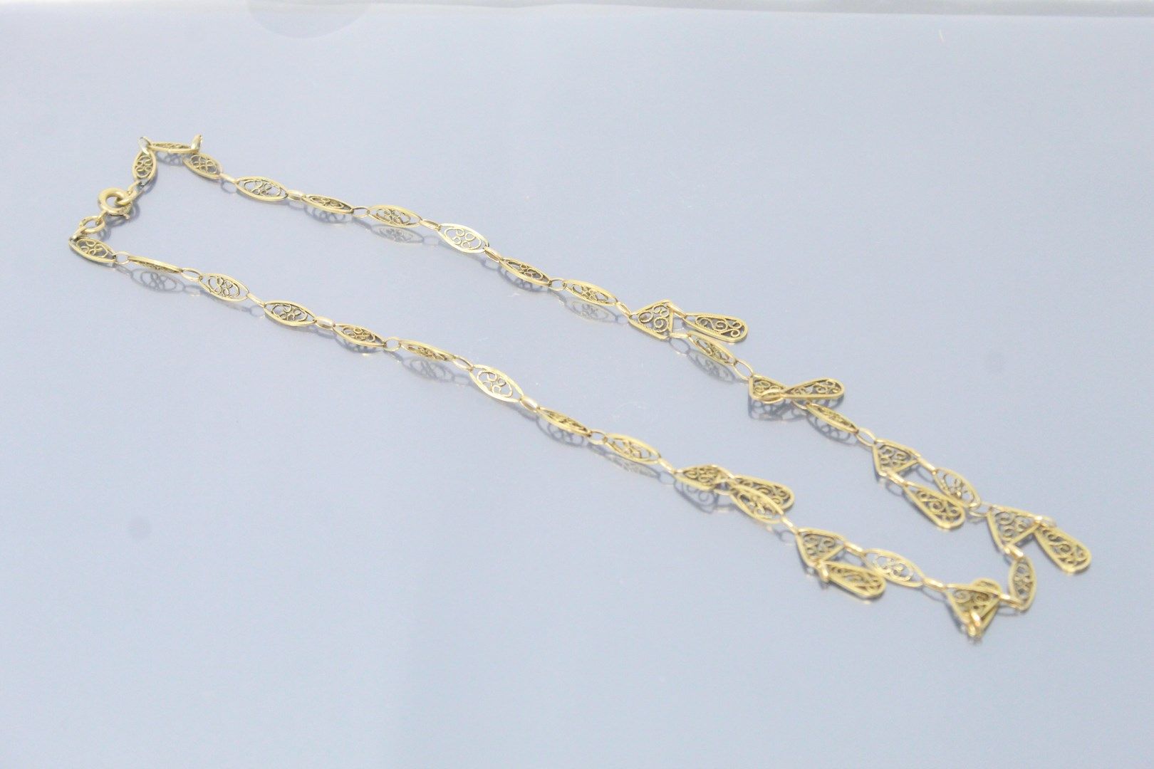 Null Necklace in 18k (750) yellow gold with filigree mesh. 

Around the neck : 4&hellip;