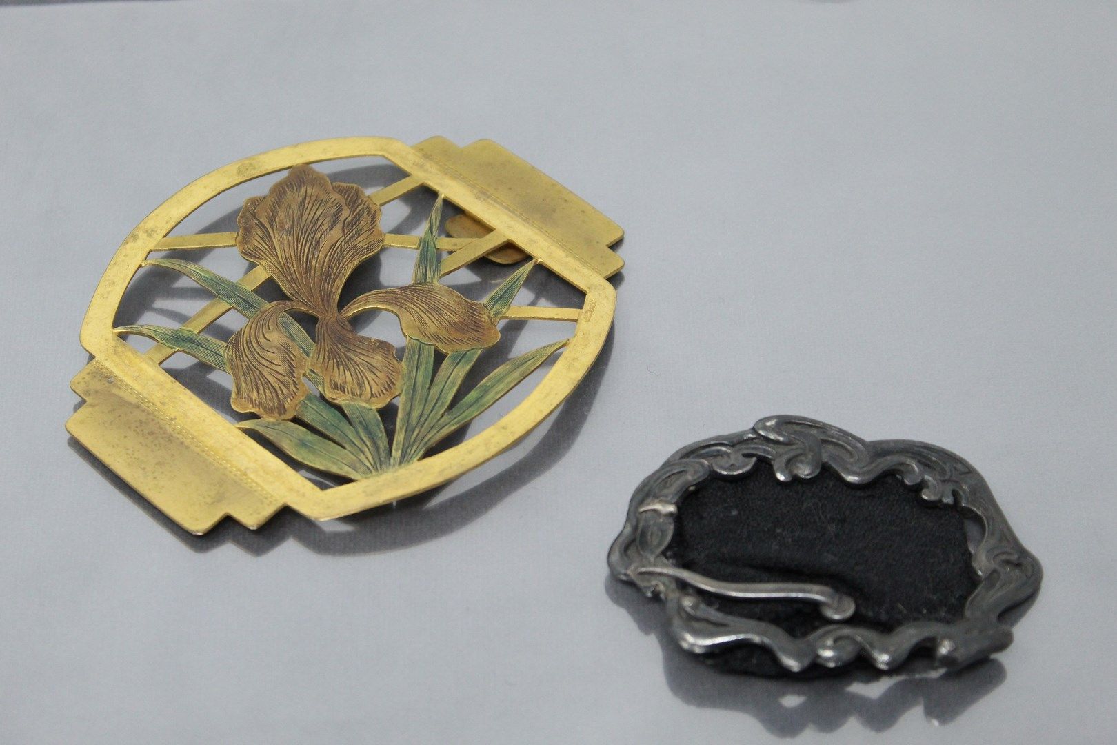 Null Set of two belt buckles in the Art Nouveau style.