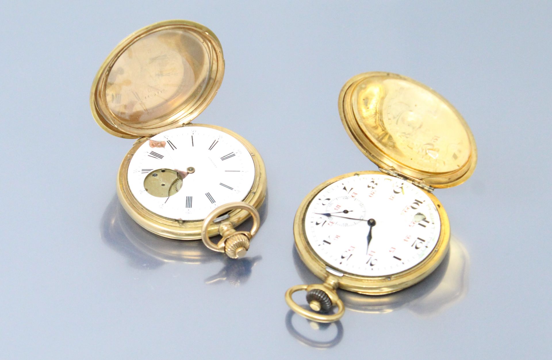 Null Remains of an 18k (750) yellow gold pocket watch. 

Diameter : 53 mm for bo&hellip;