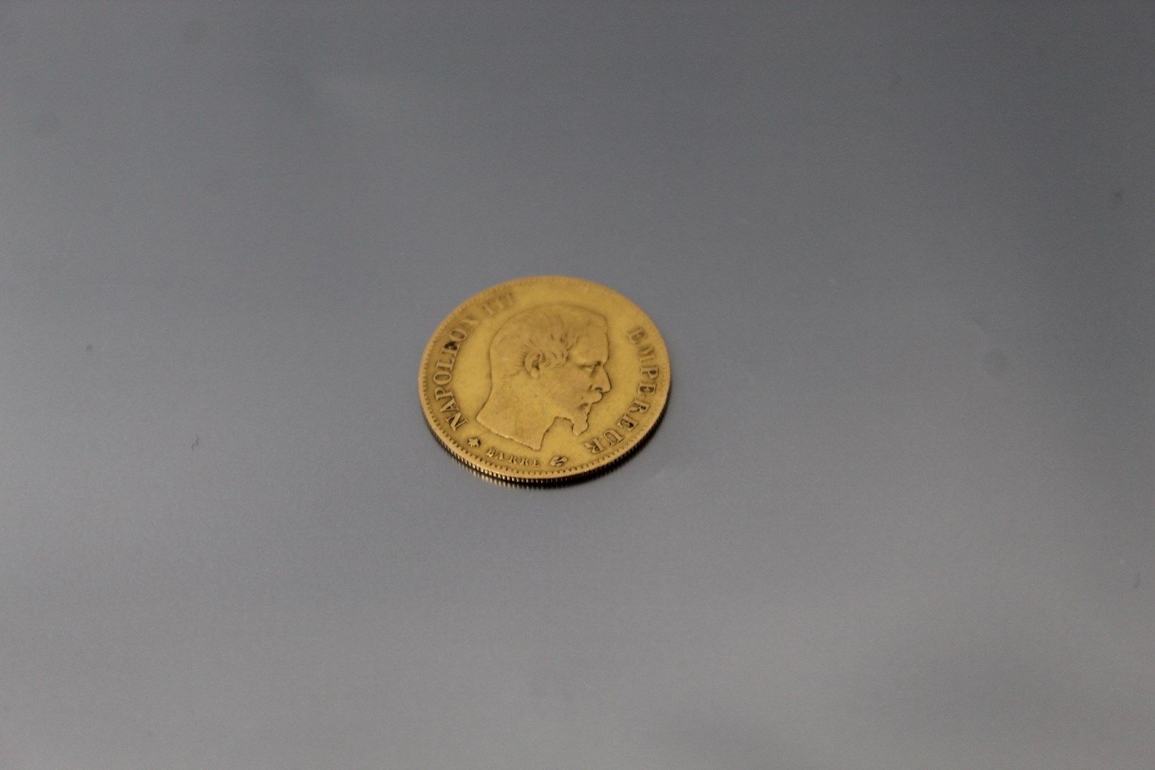 Null 10法郎金币拿破仑三世光头（1859年BB）。

VG到TTB。

重量：3.22克。