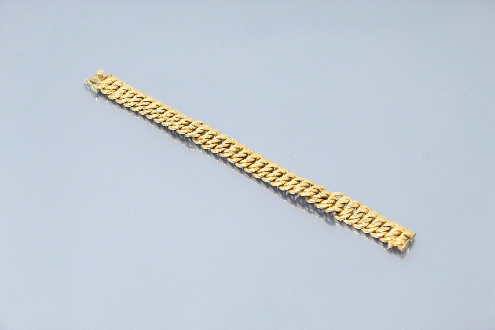 Null Bracelet en or jaune 18k (750) à maille américaine.

Poinçon de maître.

Po&hellip;