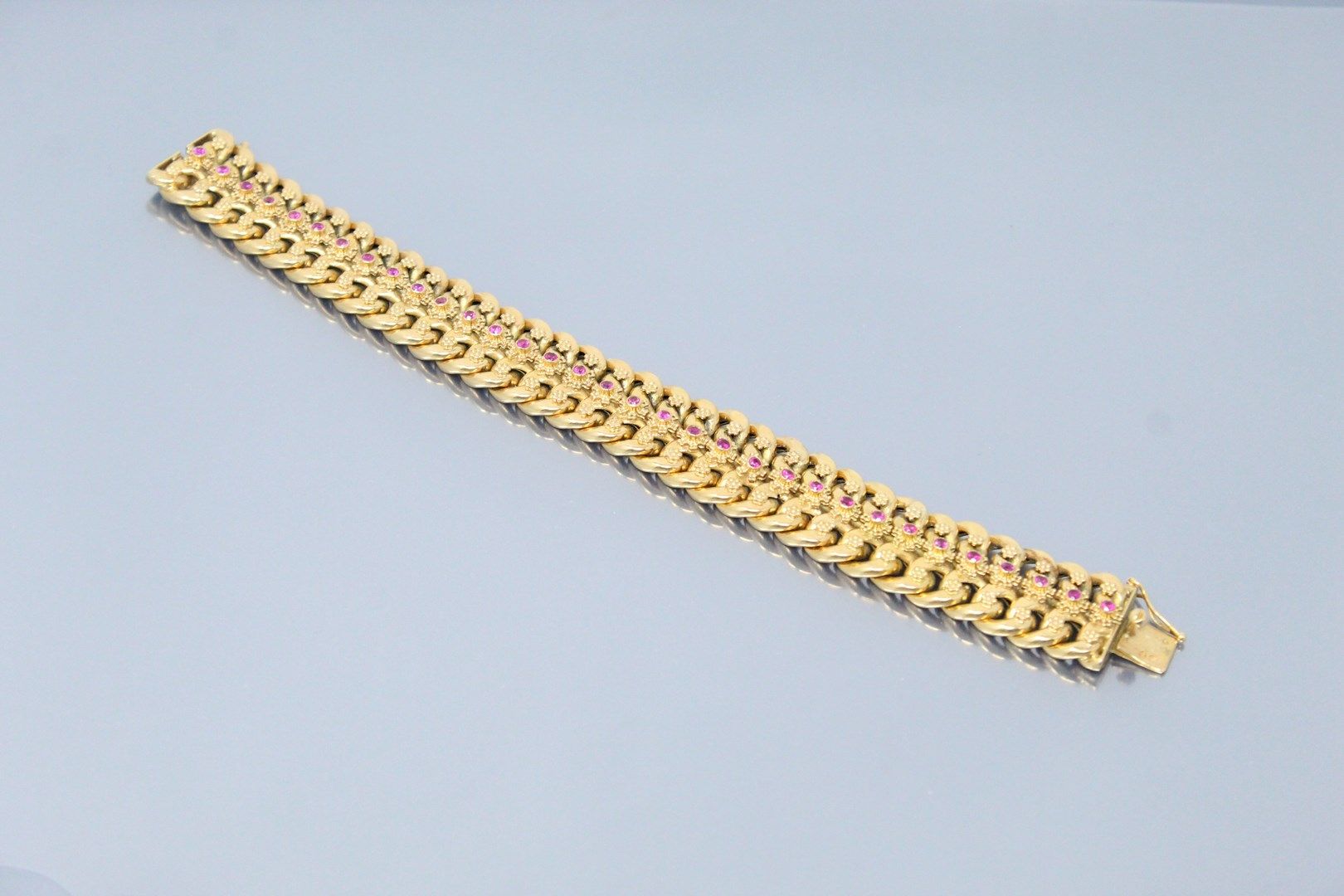 Null 18k (750) yellow gold bracelet with double curb chain and synthetic rubies.&hellip;