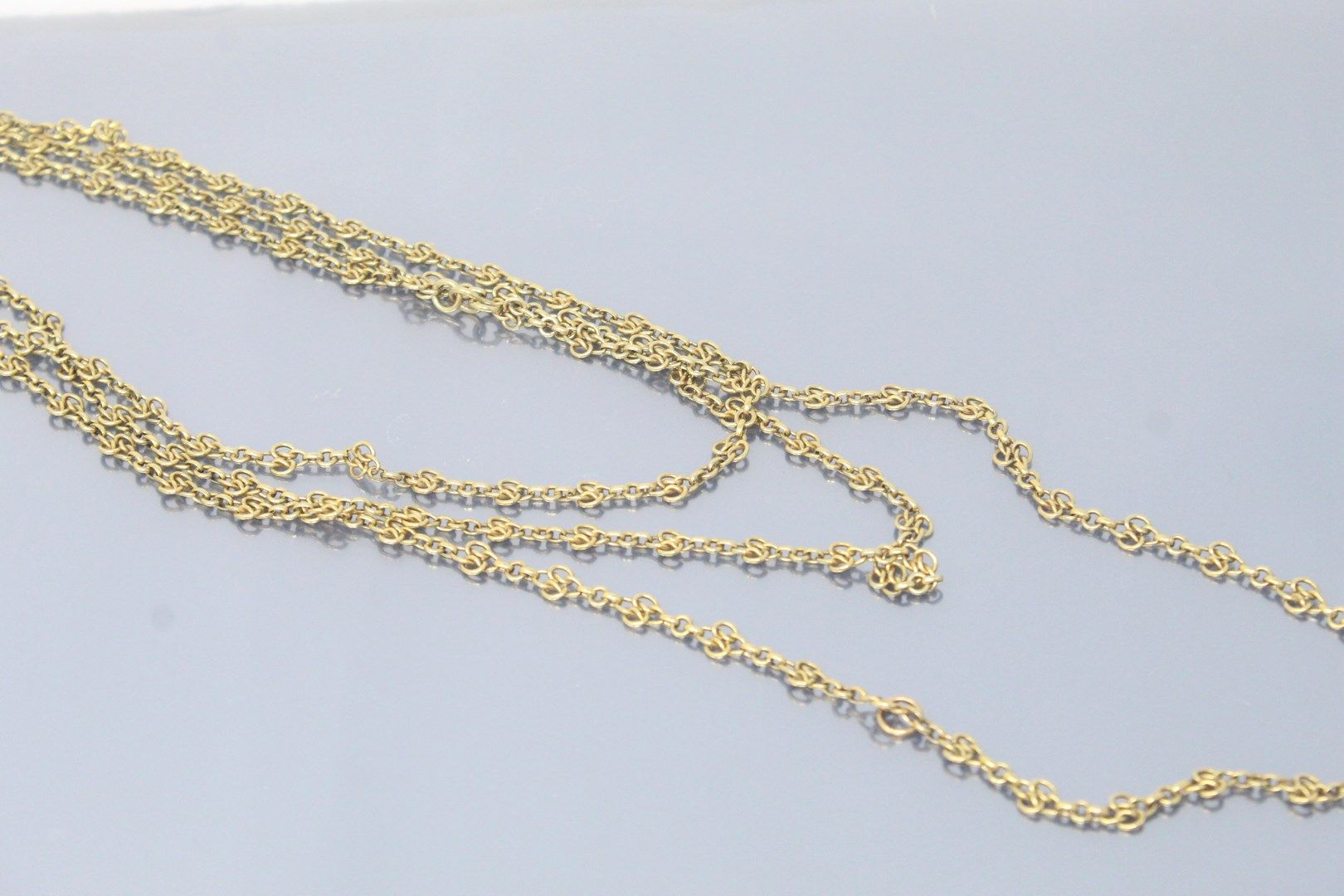 Null Long necklace in 18k (750) yellow gold with four-lobed stitches.

Eagle hea&hellip;