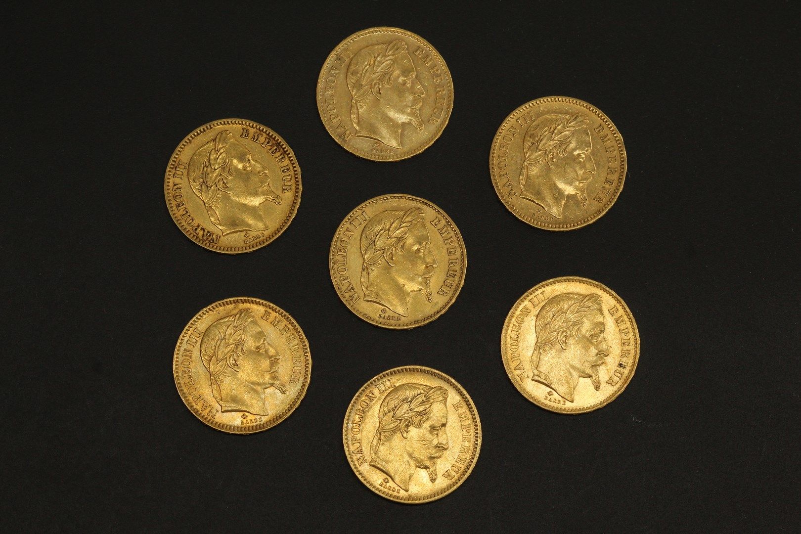Null Sette monete d'oro da 20 franchi Napoleone III testa.

1861 A (x2) - 1862 A&hellip;