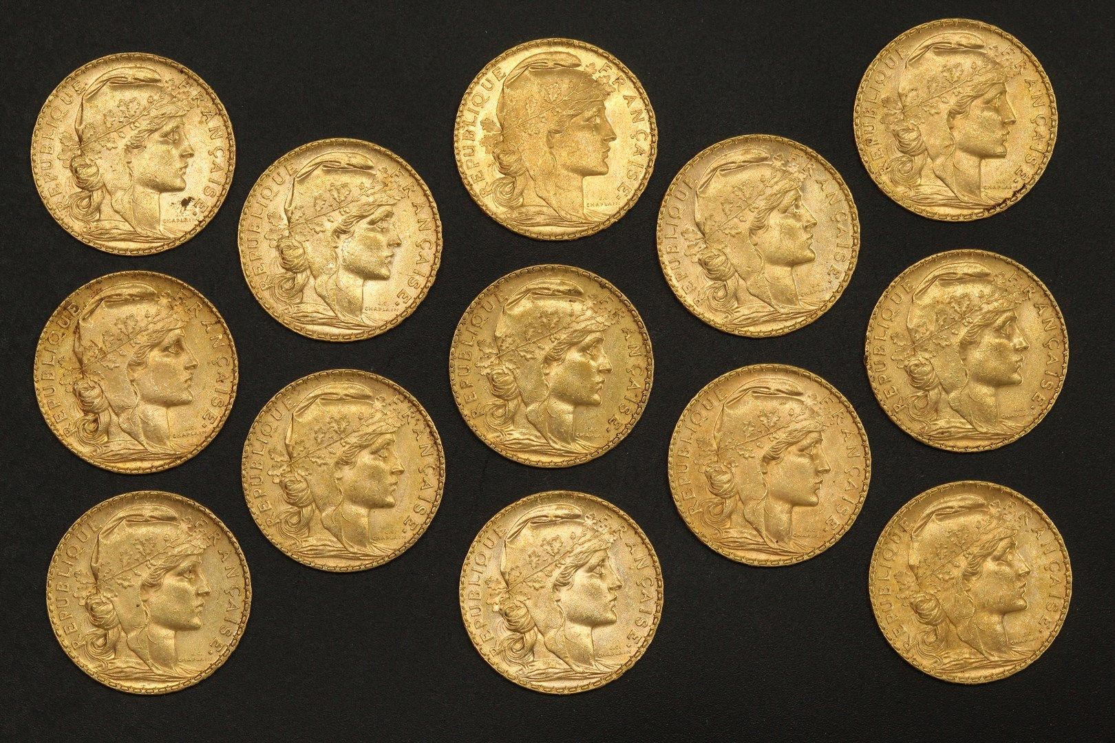 Null 十三枚20法郎的金币Coq 1907。

1907 (x13).



重量：83.80克 - VG至VG。