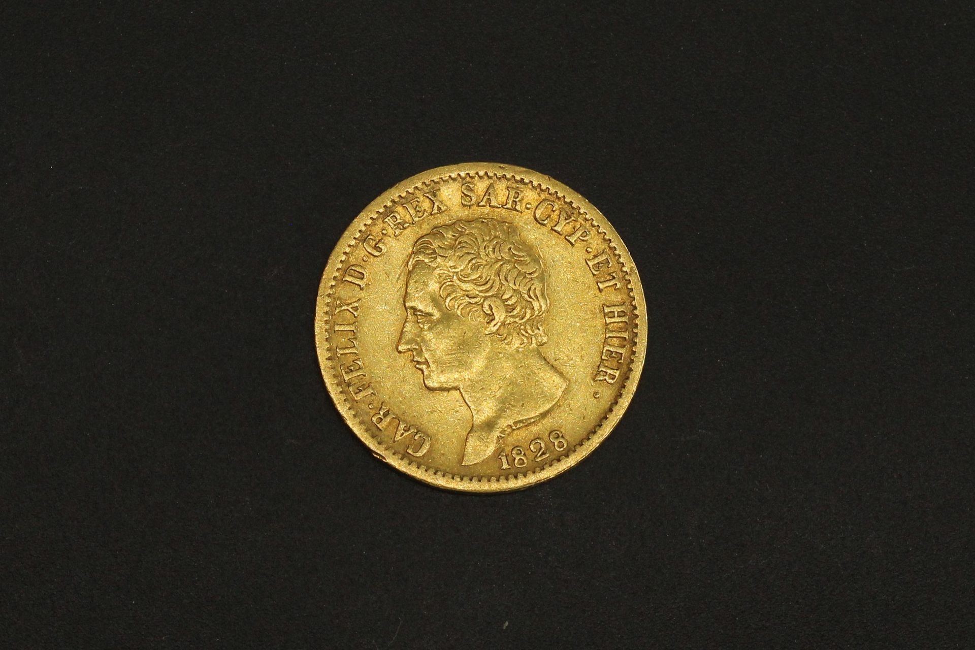 Null Moneta d'oro di 20 lire Charles Felix 1828.

1828 L (x1).



Dritto: busto &hellip;