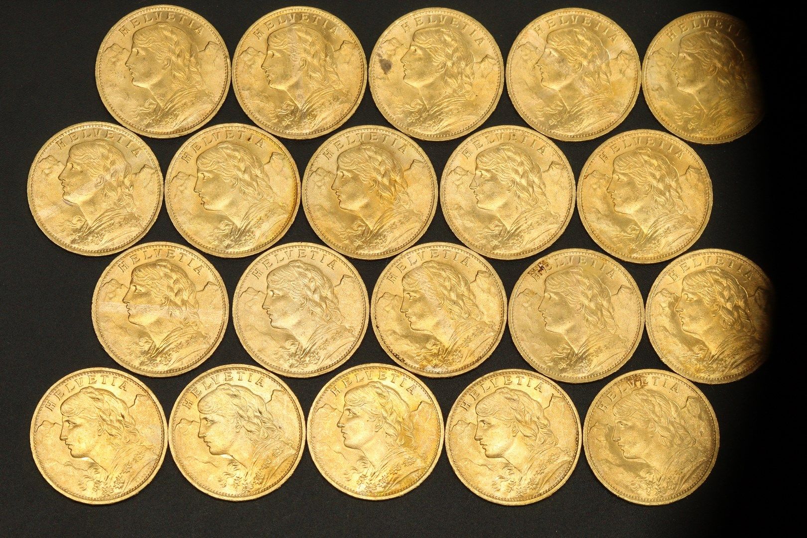Null Veinte monedas de oro de 20 francos suizos Vreneli.

1922 B (x20).



Peso &hellip;