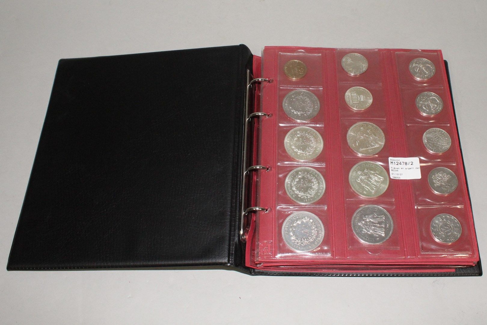 Null Monete d'argento in un album:

- 100 franchi commemorativi (x7)

- 50 franc&hellip;