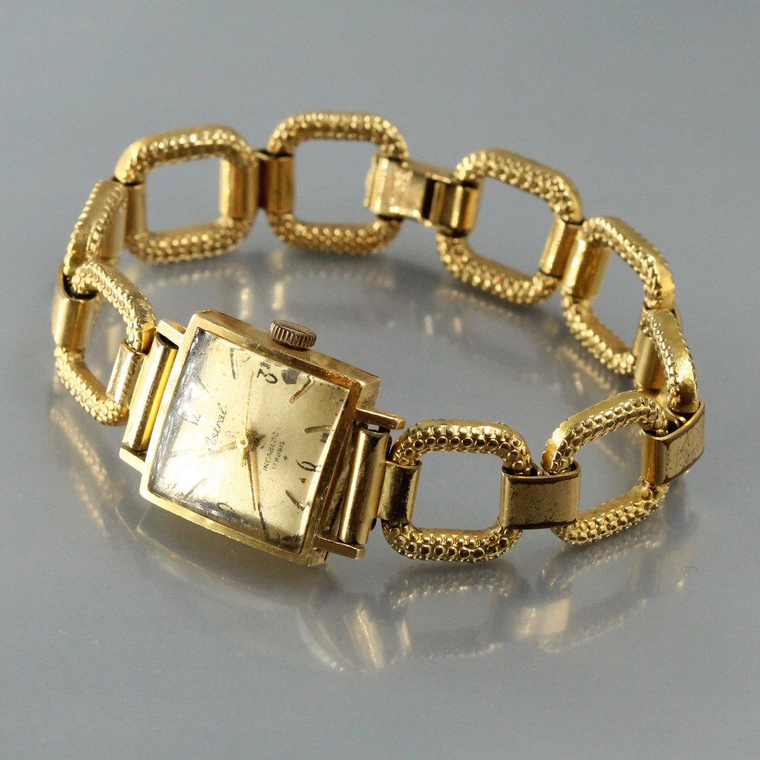 Null ASTRAL

Montre bracelet de dame, boîte carré en or jaune 18k (750), index b&hellip;