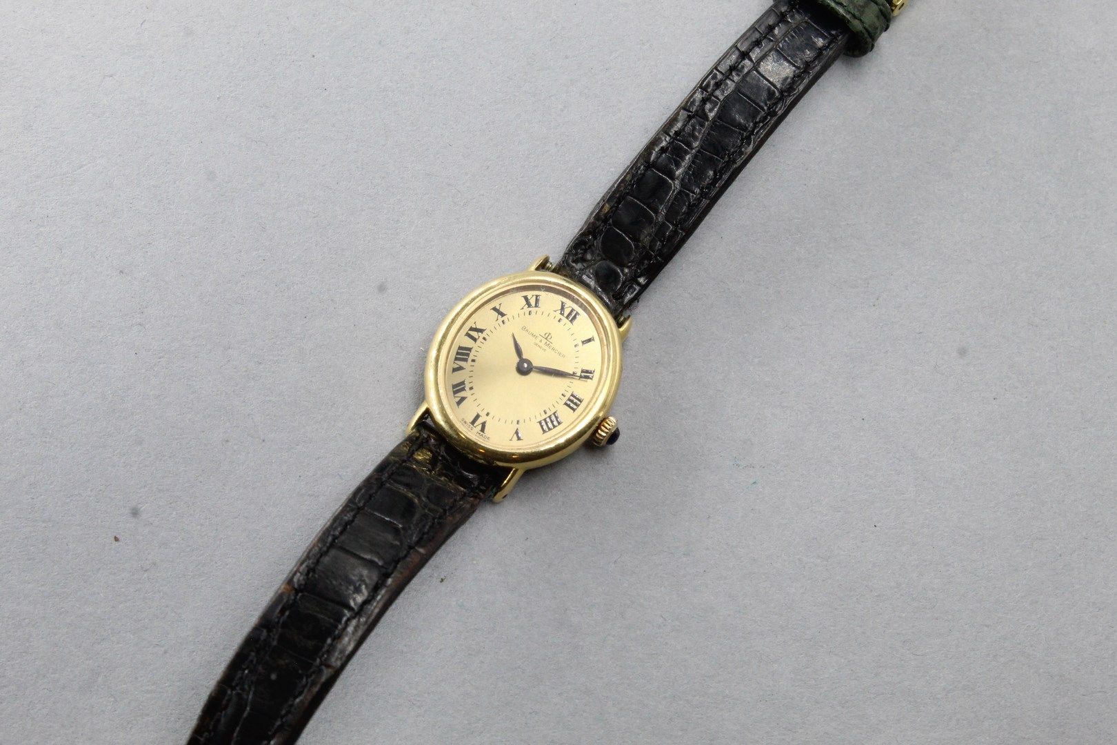 Null BAUME & MERCIER

Montre bracelet de dame, boîtier ovale en or jaune 18k (75&hellip;