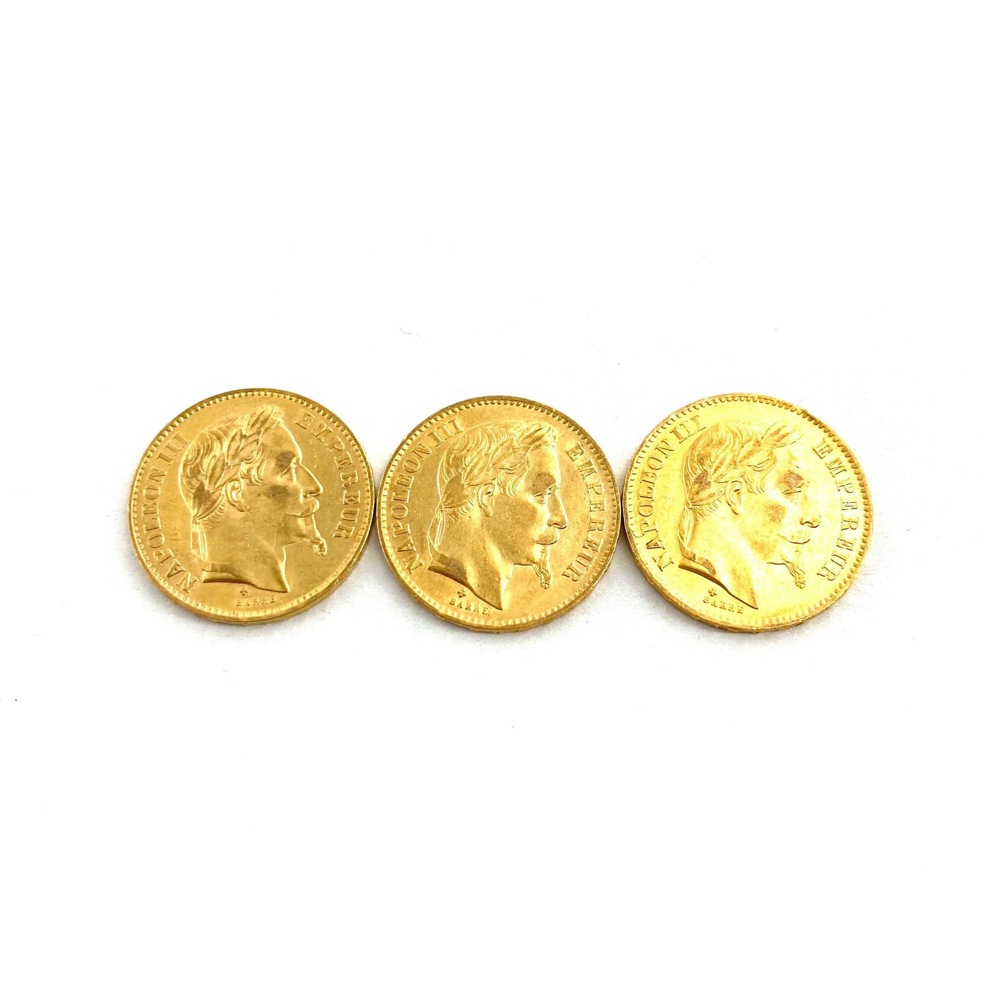 Null Tres monedas de oro de 20 francos cabeza de Napoleón III.

1867 BB (x3) 


&hellip;
