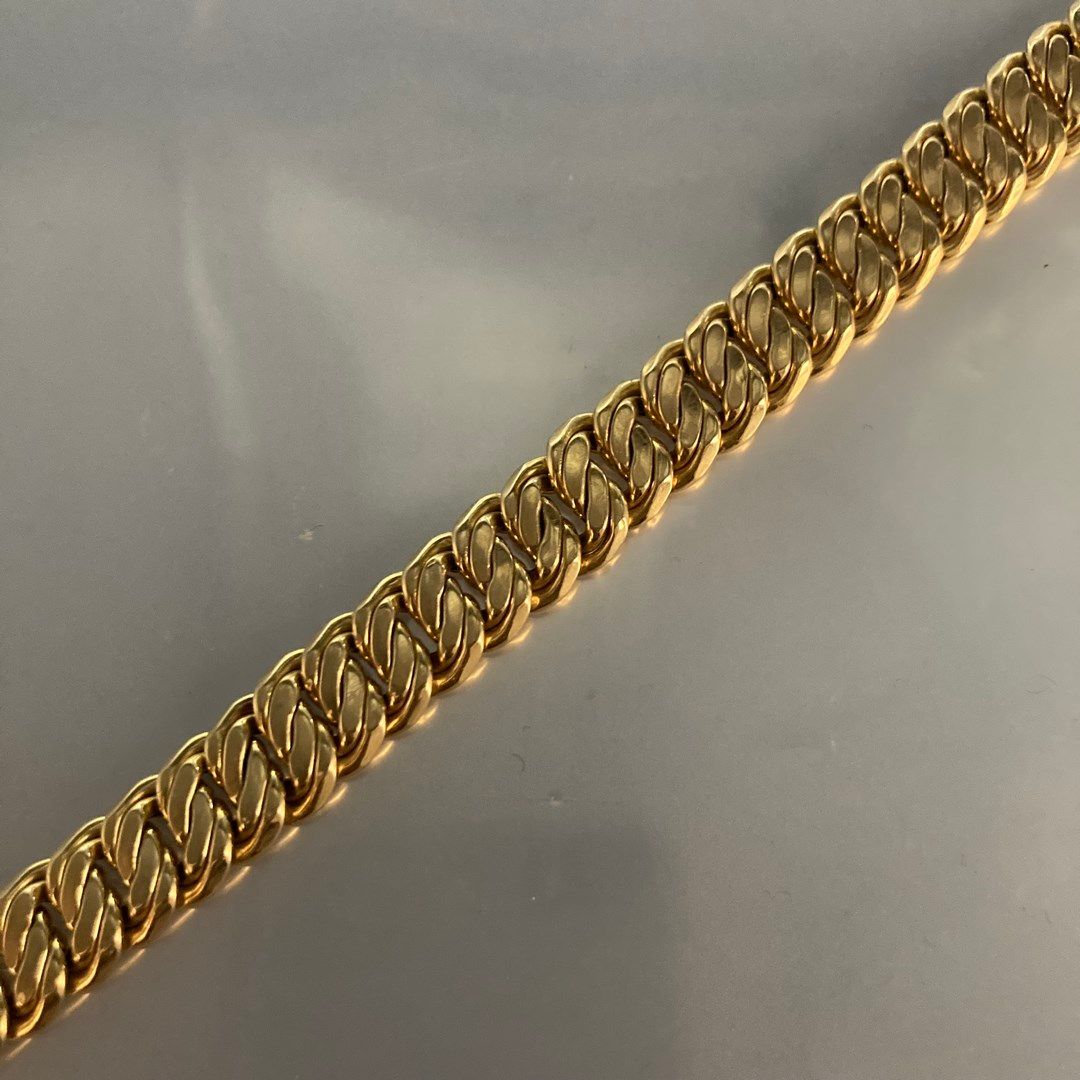 Null Armband aus 18 Karat Gelbgold (750) mit amerikanischer Masche. 

Stempel de&hellip;