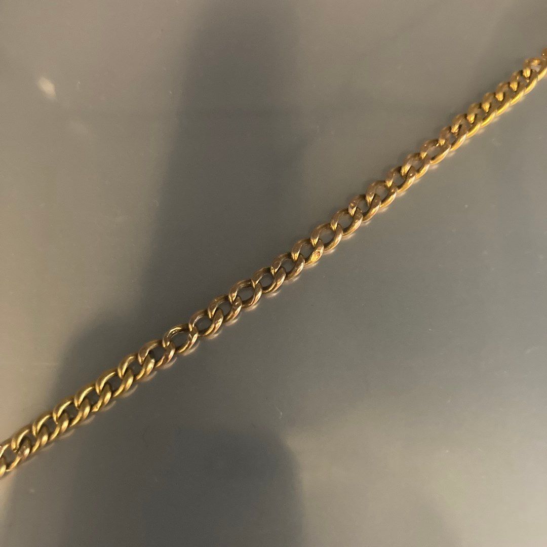 Null 18K(750)黄金制成的儿童手镯，有一条卷边链。

手腕尺寸：约12.50厘米 - 重量：2.60克。