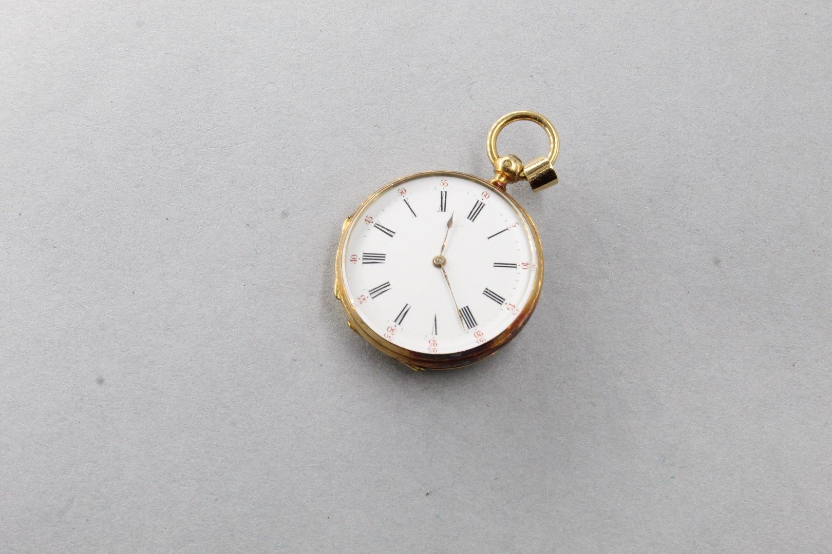 Null Pocket watch in 18k (750) yellow gold with black enamel.

Dial with Roman n&hellip;