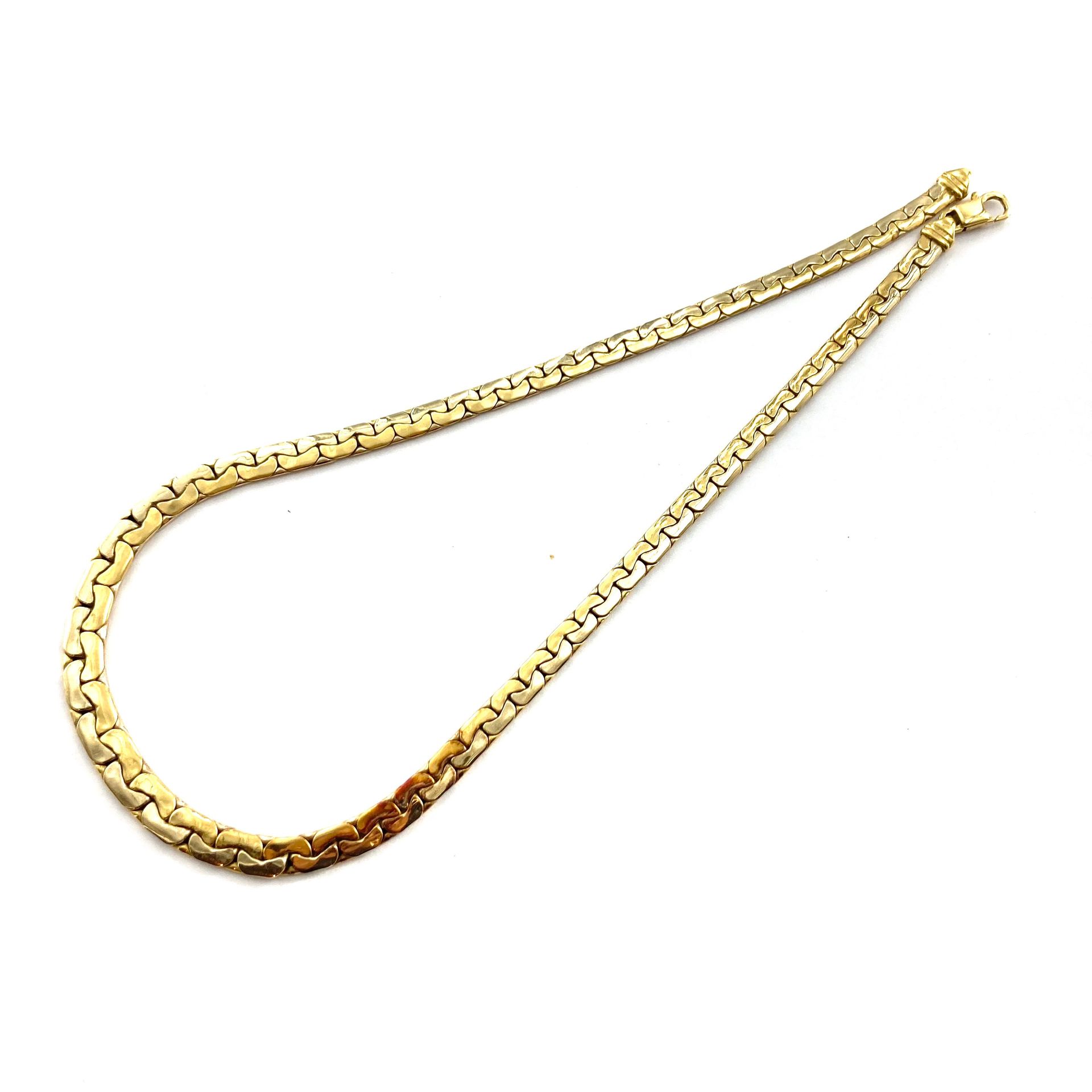 Null Halskette aus 18-karätigem Gelbgold (750), Palmier-Masche.



Halsumfang: c&hellip;