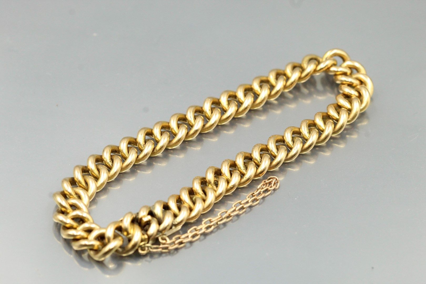 Null Bracelet in 18k (750) yellow gold with curb chain.

Wrist size : approx. 20&hellip;