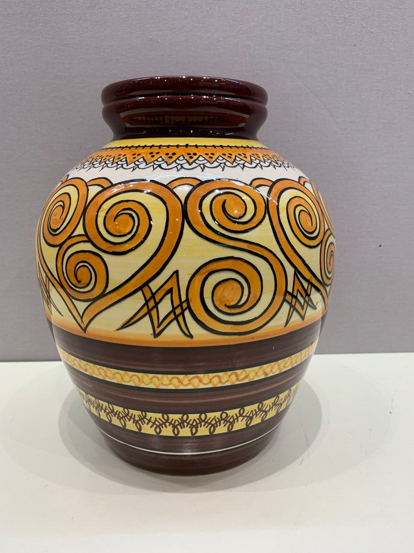 Null QUIMPER

Earthenware vase with open neck decorated with stylized friezes in&hellip;