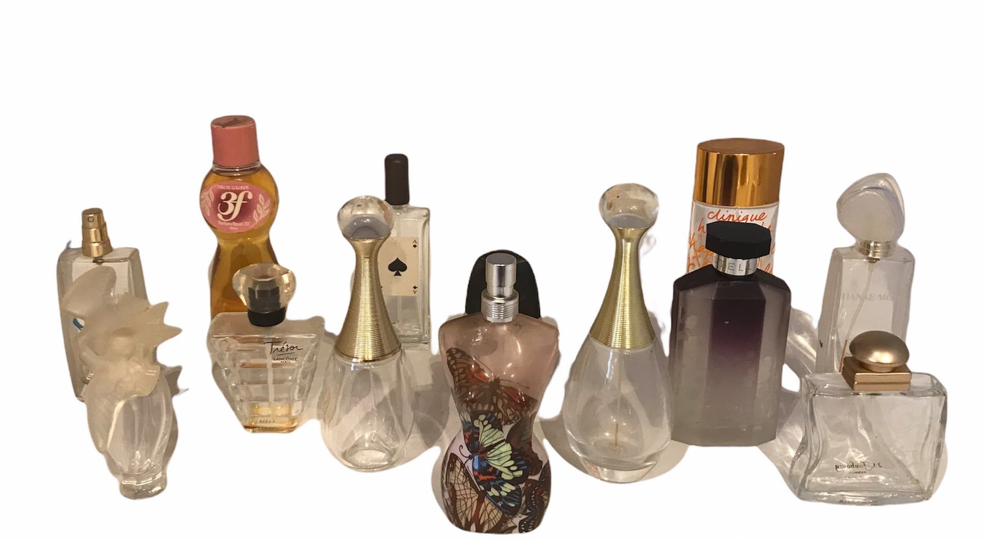 Null 一套13个香水瓶，包括Jean-Paul Gaultier, Nina Ricci, Lancôme, Dior等。