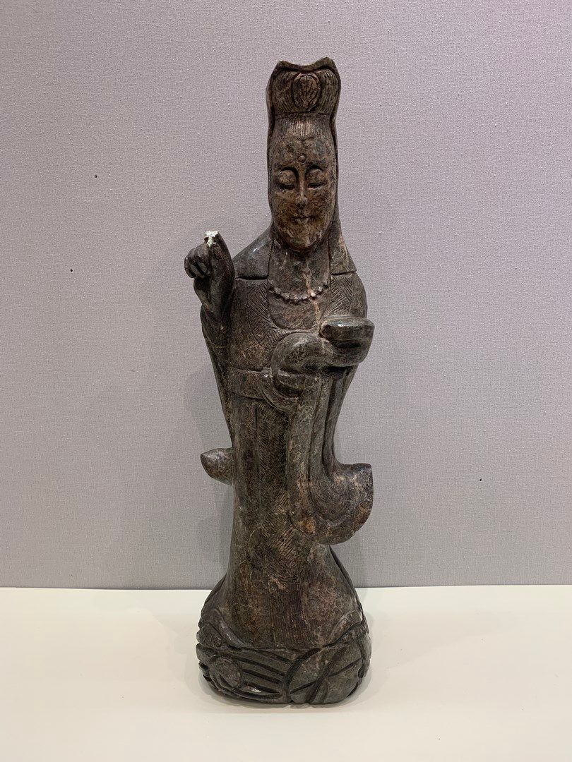 Null 
CHINA 20th century

Guanyin in hard stone

H. 51 cm

Accident on the right&hellip;