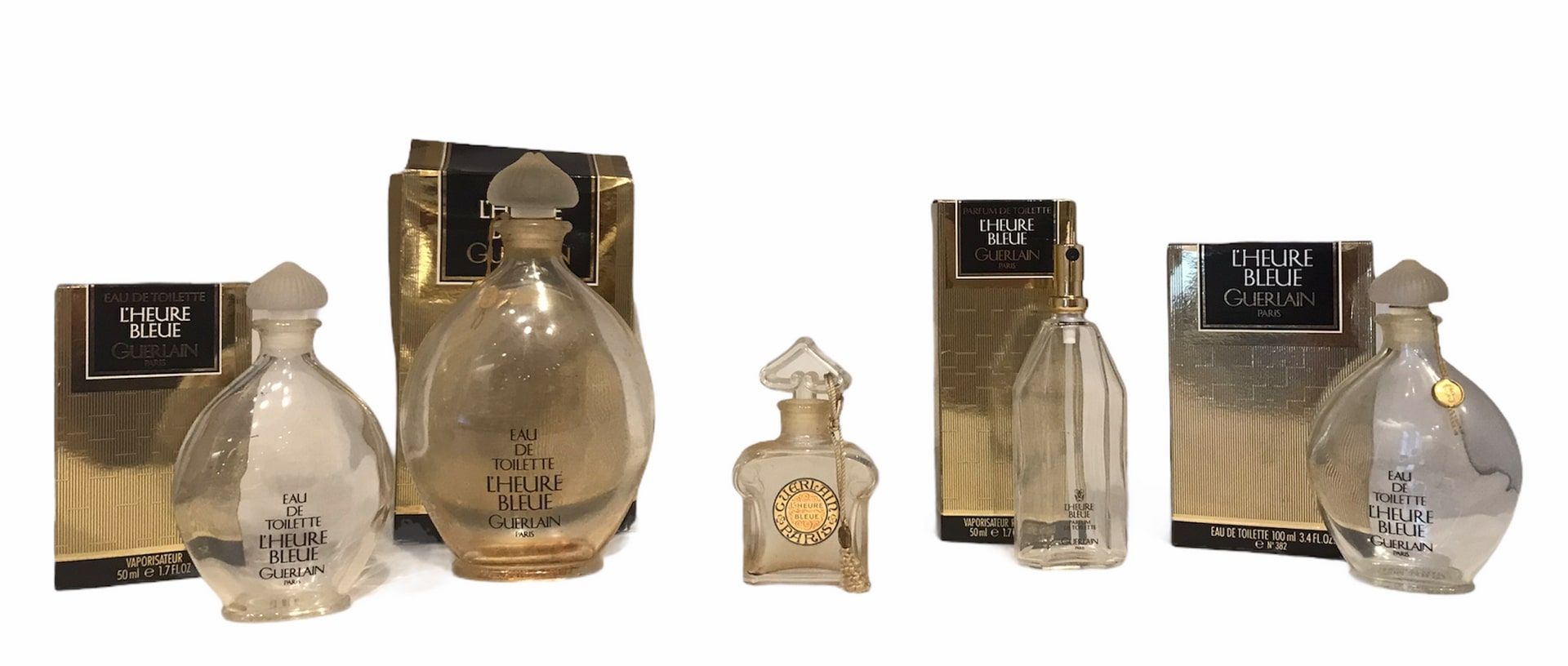 Null 顾尔伦

"L'heure bleue

花露水，三款有包装的香水和一款无盖的香水

但有其原始包装。

玻璃瓶