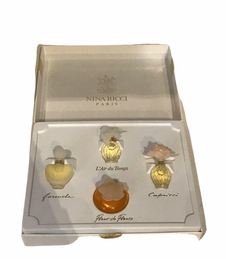 A set of Nina Ricci miniatures including 