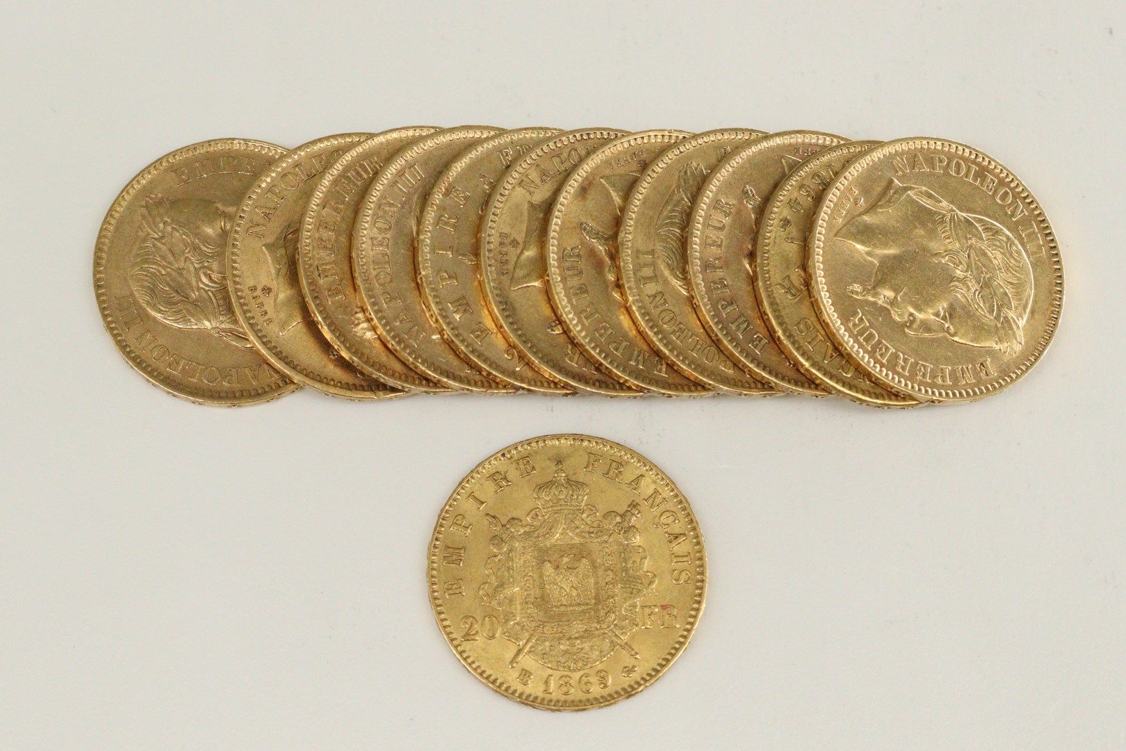 Null Lot de douze pièces en or comprenant :

- 1 x 20 francs Napoléon III tête l&hellip;