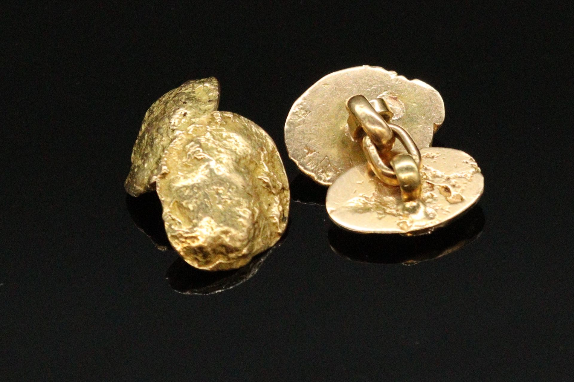 Null Pair of cufflinks in 18K (750) yellow gold

Weight : 21.21 g.