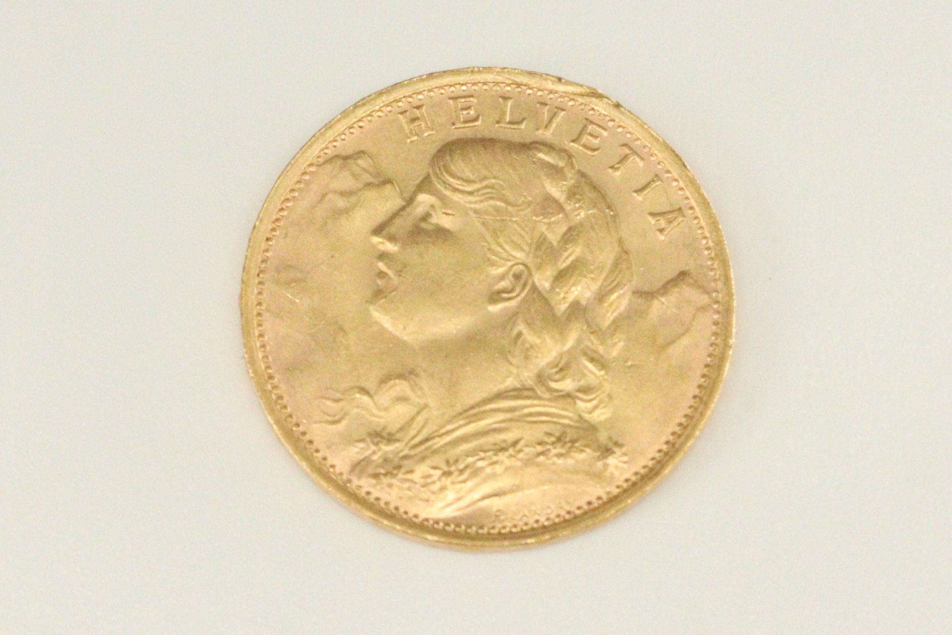 Null Pièce de 20 francs Helevtia (1935).

TTB à SUP.

Poids : 6,45 g.