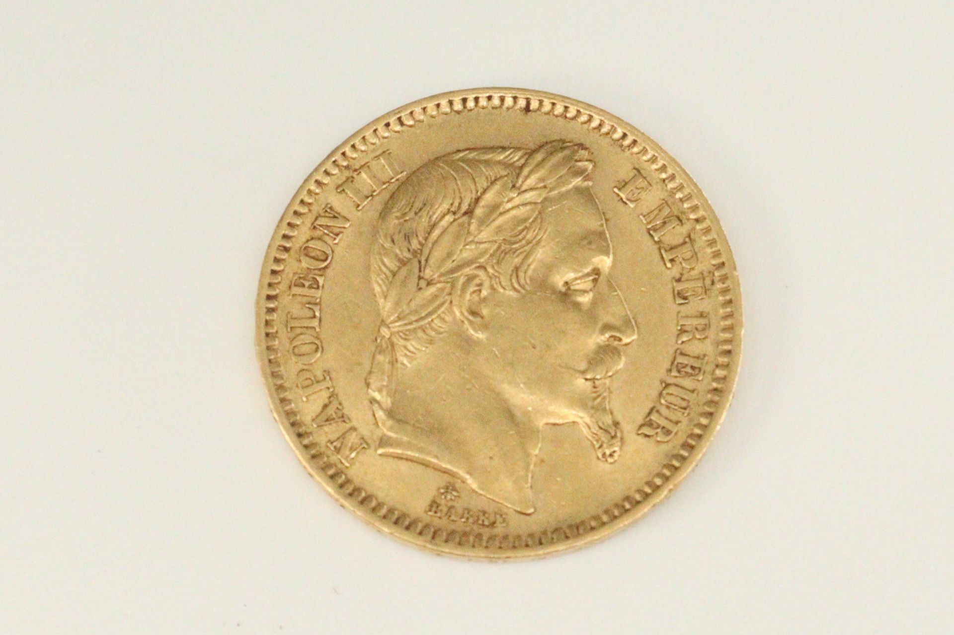 Null Pièce en or de 20 francs Napoléon III tête nue (1854 A)

TTB

Poids : 6.45 &hellip;