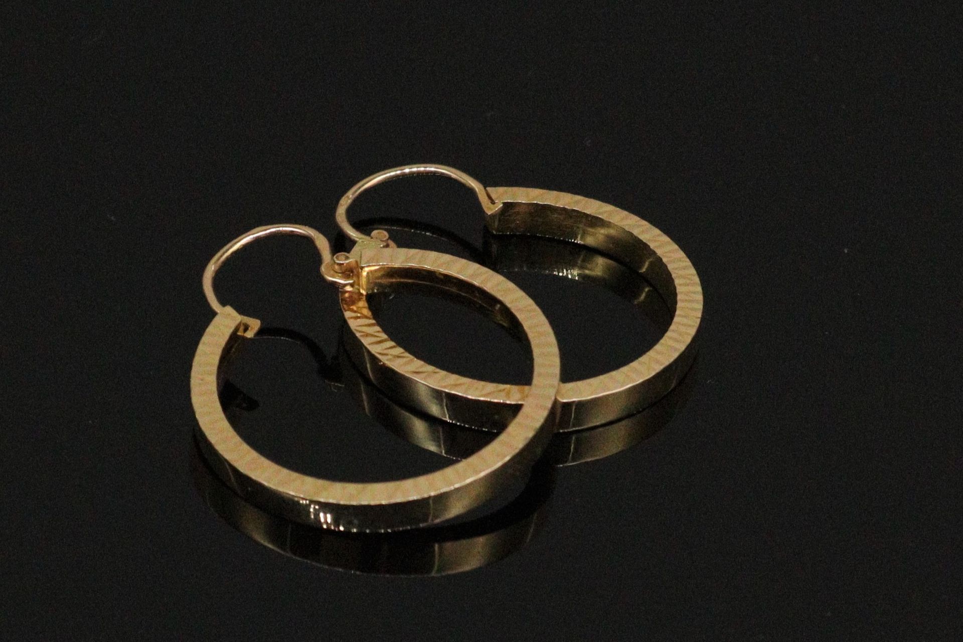 Null 一对18K（750）黄金 "克里奥尔 "耳环。



重量：2.70克。