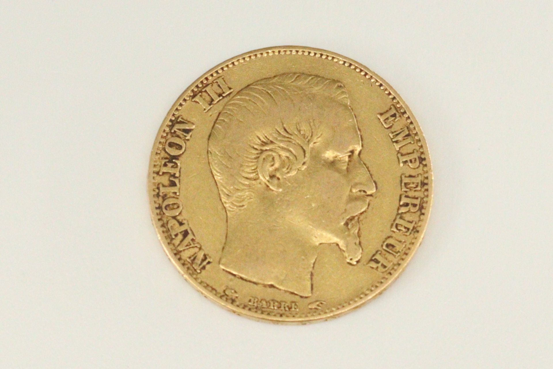 Null Pièce en or de 20 francs Napoléon III tête laurée (1864 A)

TTB

Poids : 6.&hellip;