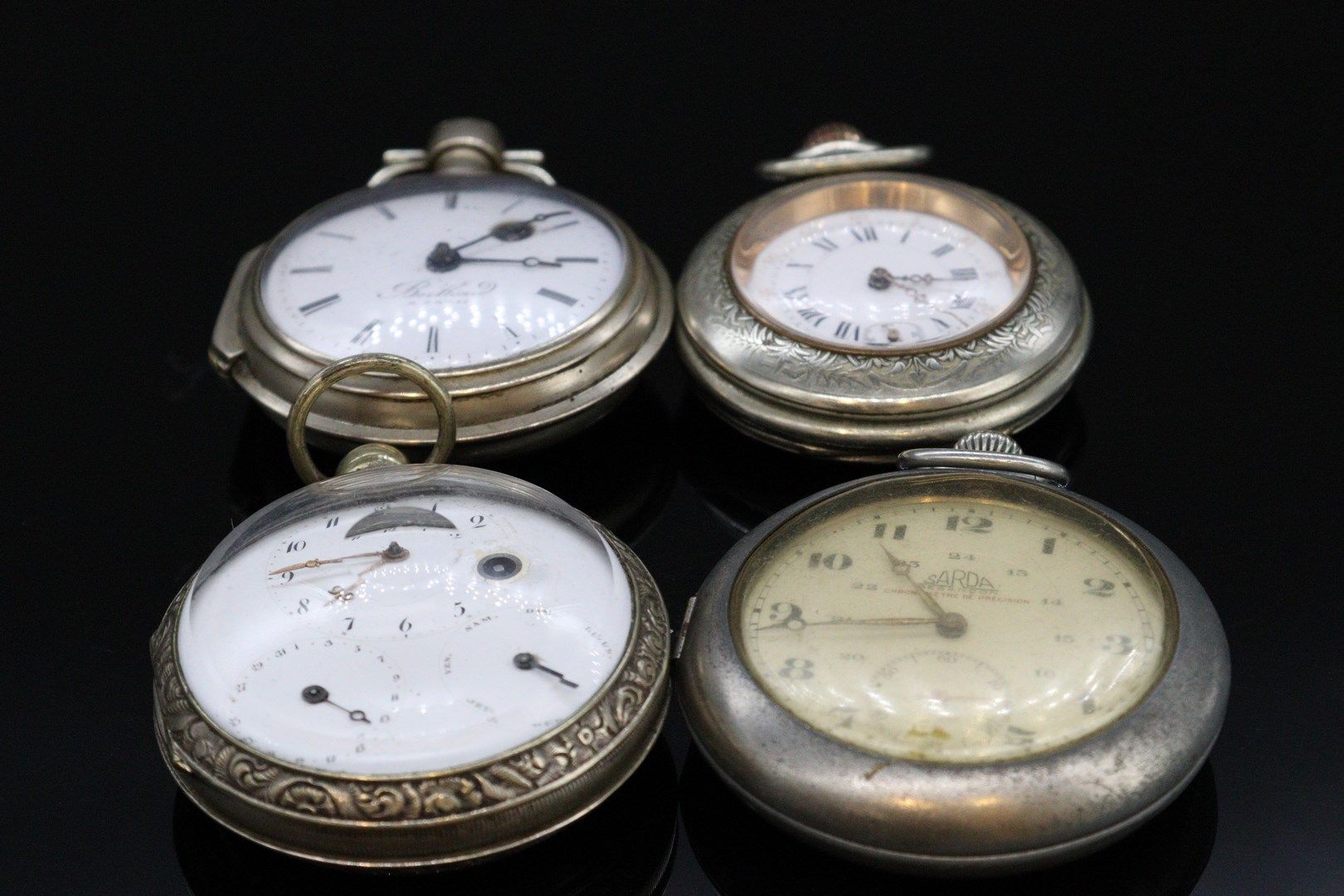 Null Lot of silver and metal pocket watches, some with rooster movement. 

Gross&hellip;