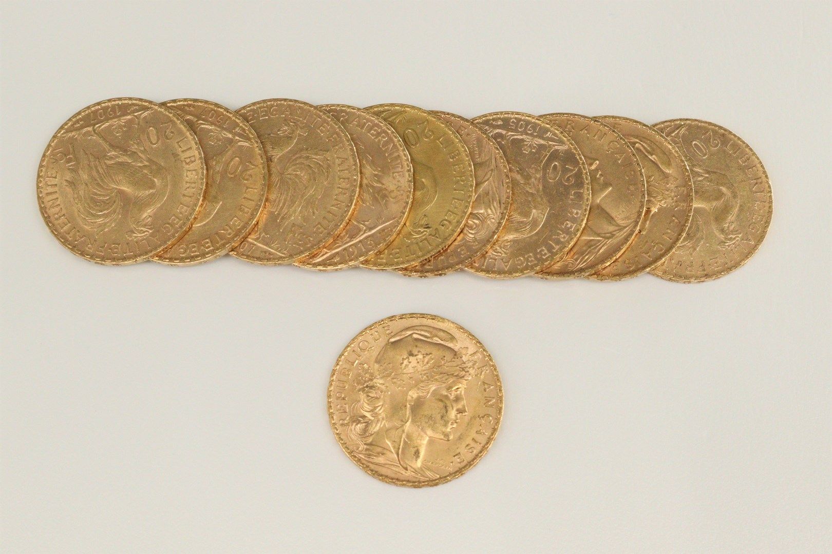 Null Lot de onze pièces en or de 20 francs au Coq. (1905 x2 ; 1906; 1907 x3 ; 19&hellip;