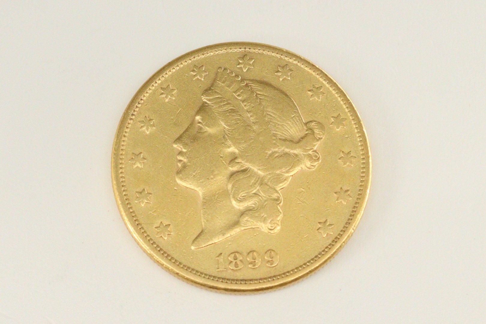 Null 20 dollar gold coin "Liberty Head - Double Eagle

Weight: 33.30 g.