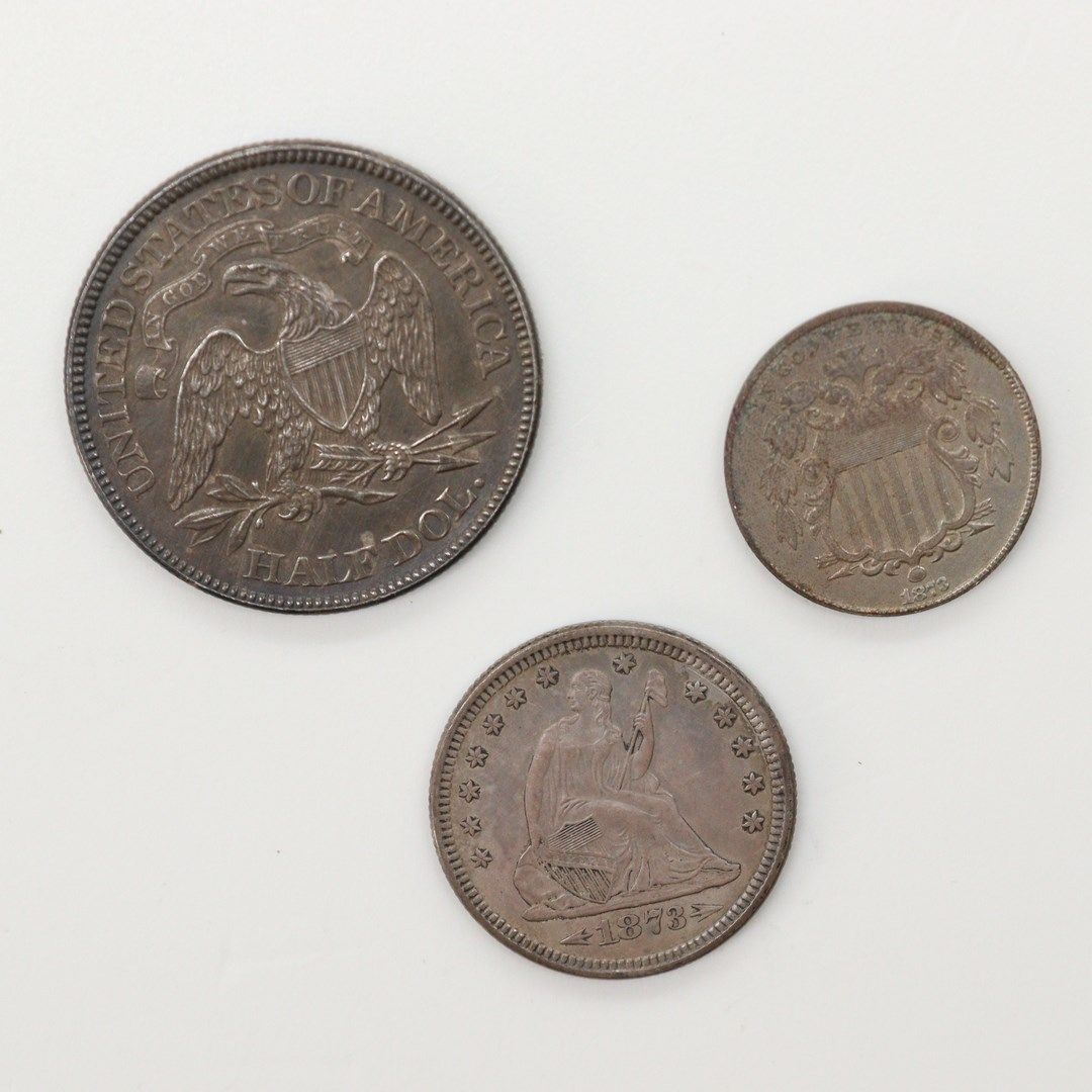 Null 美国

一批3枚硬币:

- 1873年费城银质半价和四分之一美元，日期周围有箭头的类型。

KM107和106。

非常轻的刷子，TTB到SUP。
&hellip;