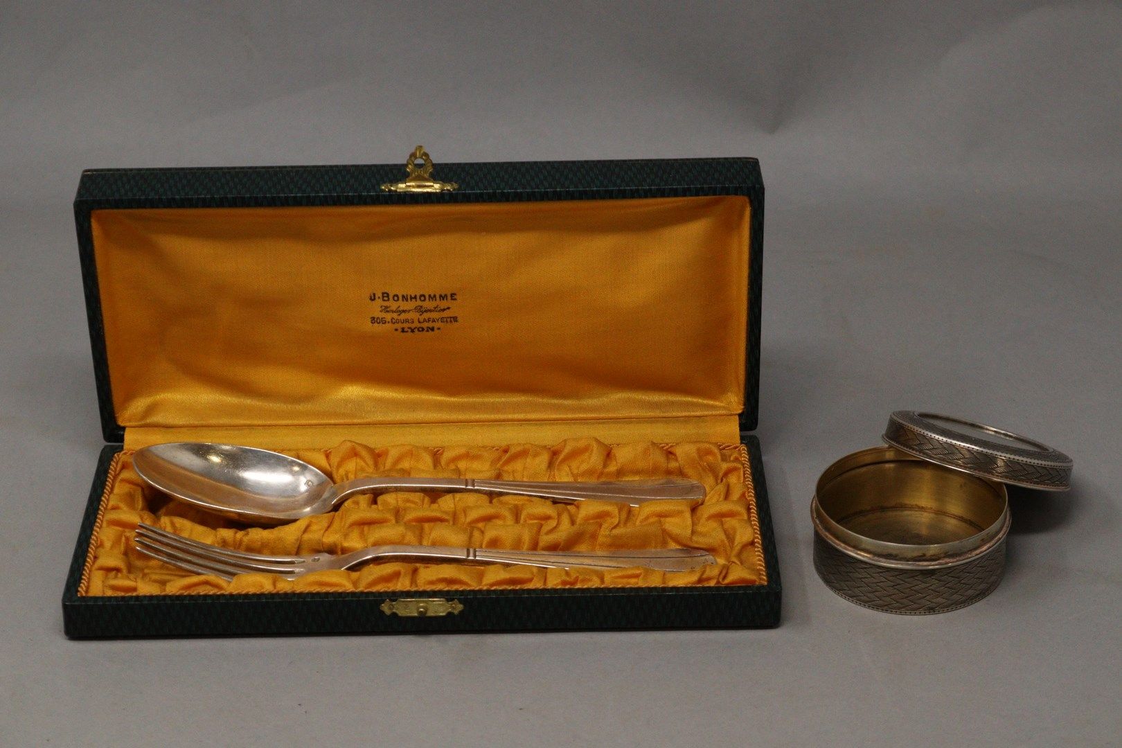 Null Lot of silverware including : 

- two silver baptismal cutlery. 

Minerve h&hellip;