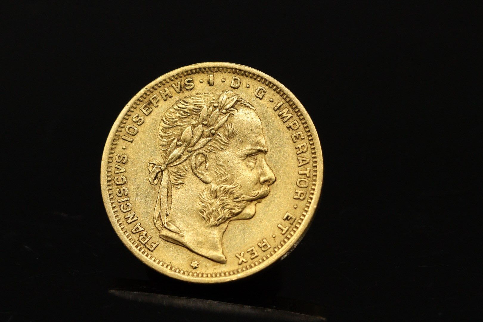 Null 弗朗索瓦一世20法郎/8弗罗林的金币（1892年）tête laurée。

重量：6.43克。