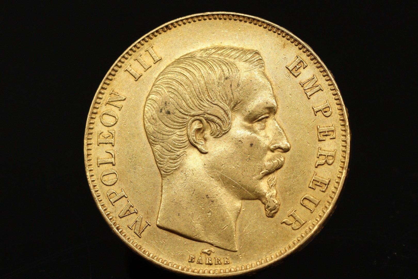 Null 50-Franc-Goldmünze Napoleon III. Mit nacktem Kopf (1858 A). 

TTB bis SUP. &hellip;