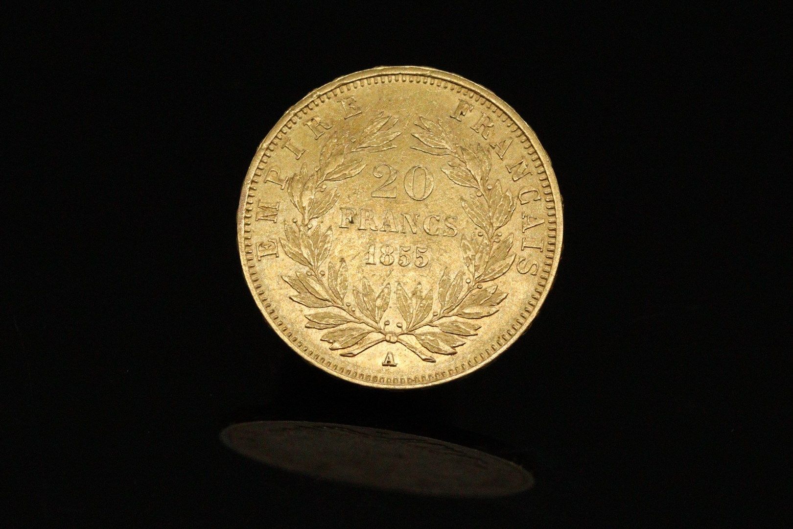 Null Gold coin of 20 Francs Napoleon III bare head, 1855, A.

Weight : 6.45g.