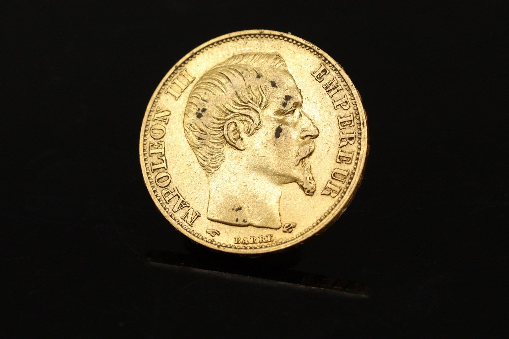 Null 
Moneda de oro de 20 francos Napoleón III con la cabeza descubierta (1857)
&hellip;