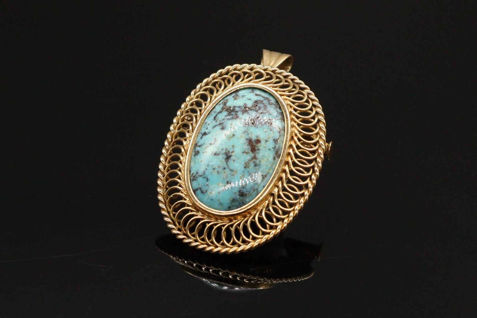 Null Pendant - brooch in 18k (750) yellow gold with a turquoise cabochon. 

Ht: &hellip;