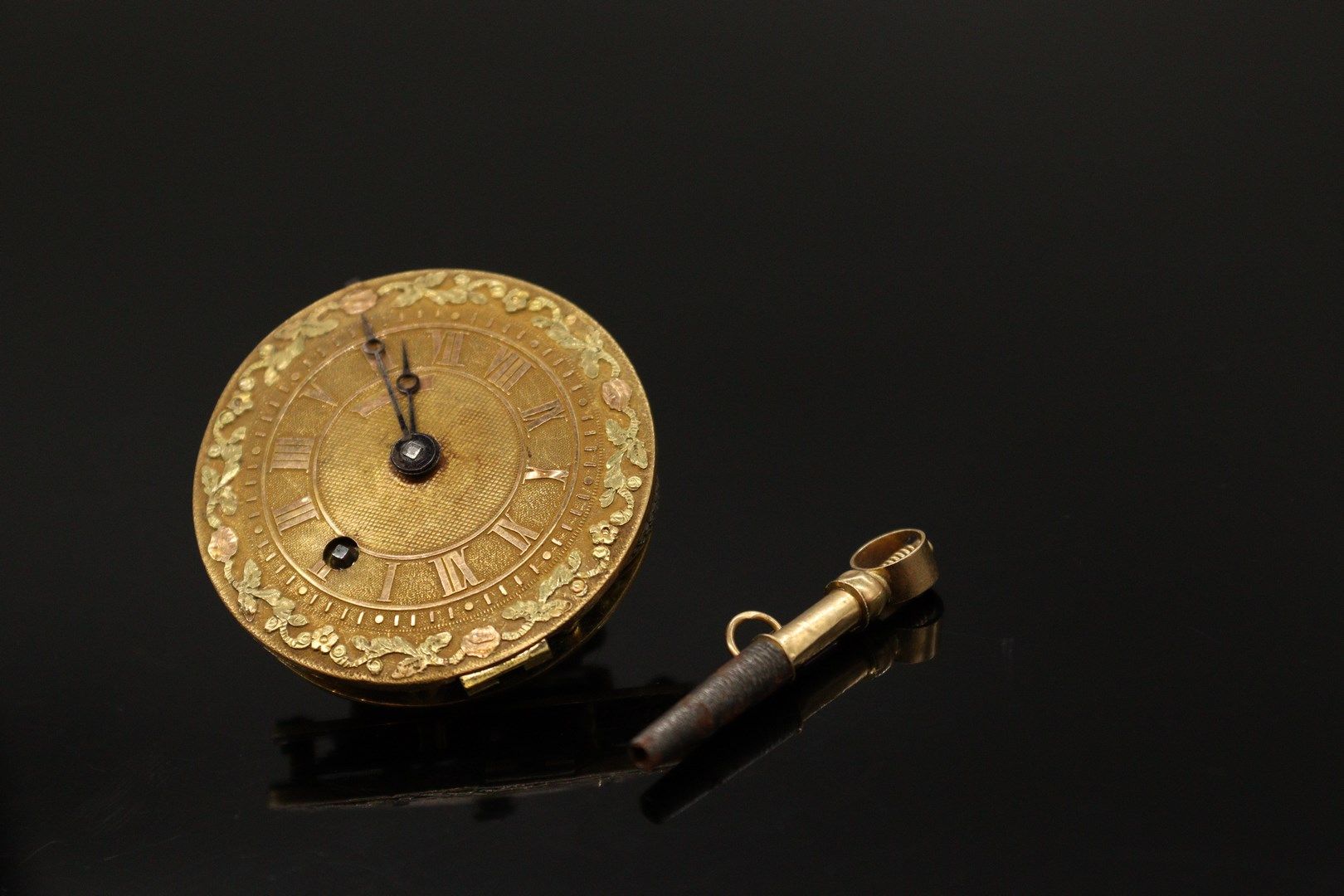 Null Watch movement with a cock and its winding key

Gross weight: 20.51 g.